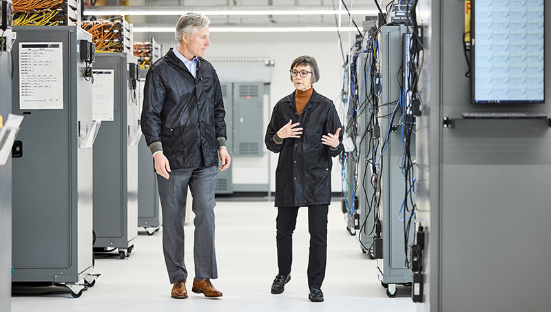 Curtiss-Wright employees walking through a facility